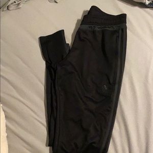 Black and gray adidas 3 stripe pants